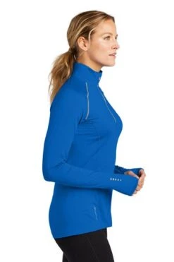 Ogio Shirts: Women's LOE335 EBL Electric Blue Nexus 1/4-Zip Pullover -Wrangler Shop 6672 elecblue 3 loe335elecbluemodelside4 337w