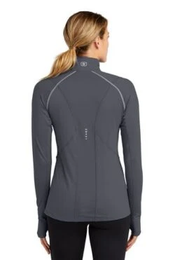 Ogio Shirts: Women's LOE335 GGY Gear Grey Nexus 1/4-Zip Pullover -Wrangler Shop 6672 geargrey 2 loe335geargreymodelback3 337w